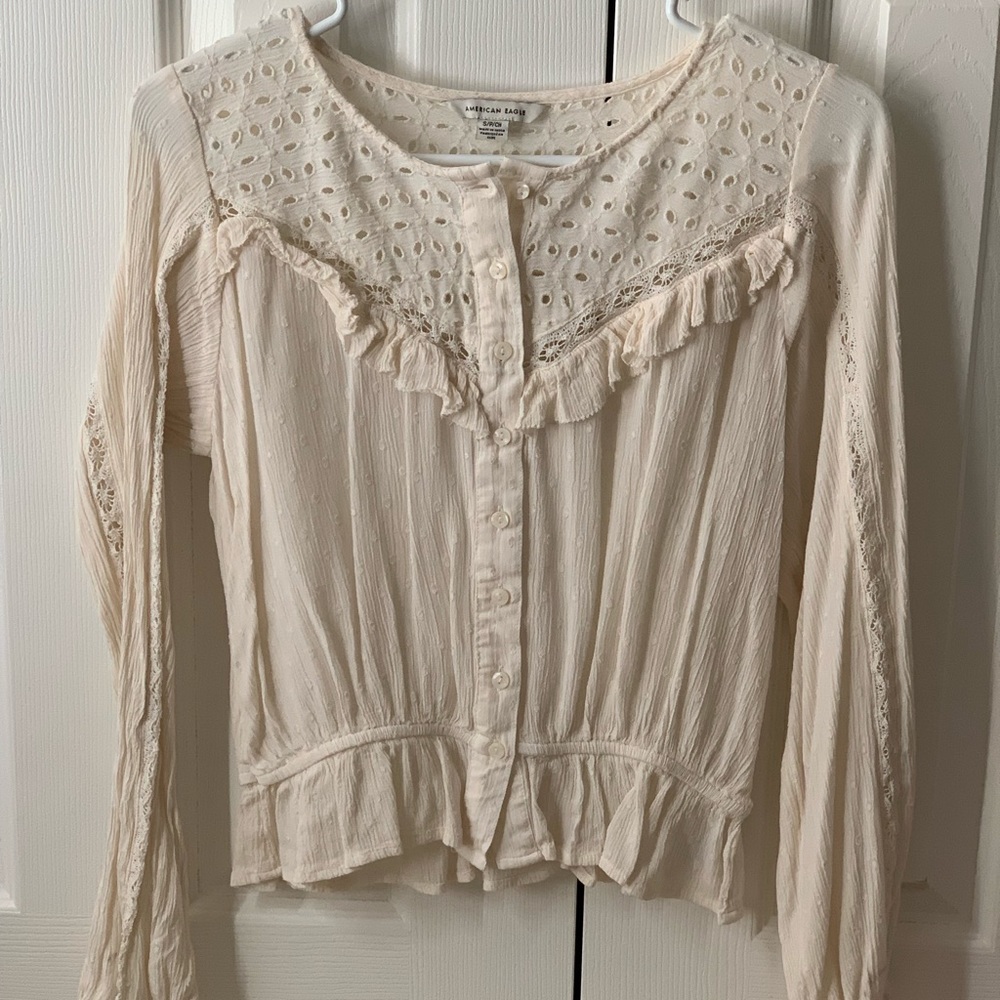 Cream button up long sleeve. Worn once.